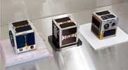 AAU Cubesat, DTUsat, CanX-1 in the UTIAS/SFL Clean Room